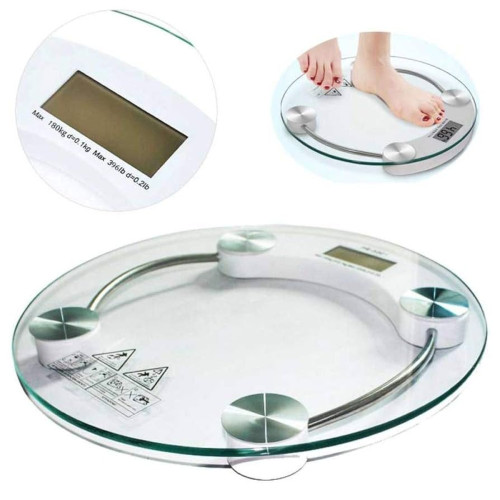 Pèse-personne électronique rond en verre trempé transparent avec écran numérique LCD et capteurs métalliques.