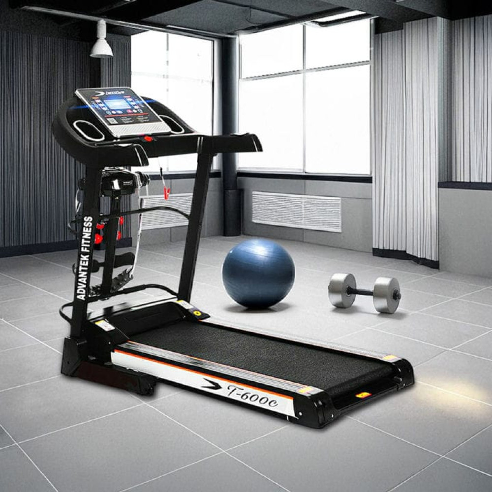 Tapis de course électrique noir et orange de la marque E-SPORT avec appareil de massage et haltères intégrés