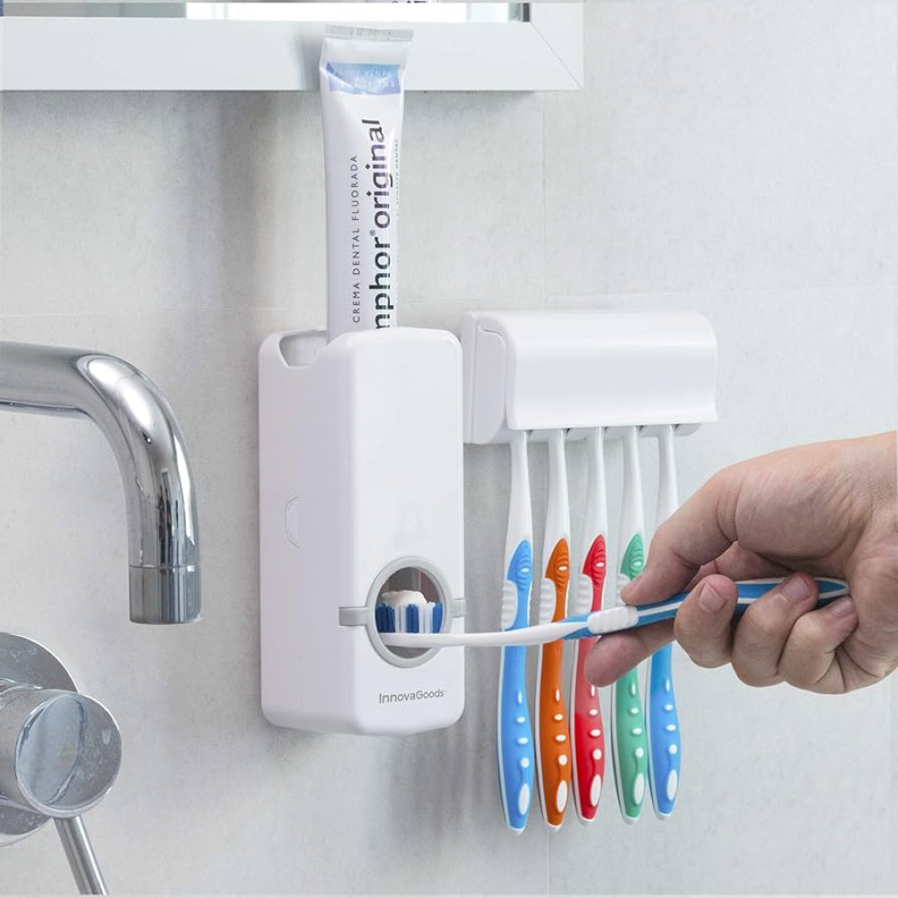 distributeur-automatique-dentifrice-porte-brosses-innovagoods-15x6x6cm Distributeur de dentifrice automatique blanc InnovaGoods fixé au mur avec un tube de dentifrice et un porte-brosses contenant cinq brosses à dents colorées