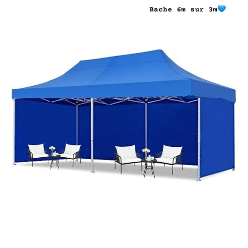 Grande tente tonnelle de jardin pliante bleue de 6x3 mètres abritant une grande table dressée pour un repas