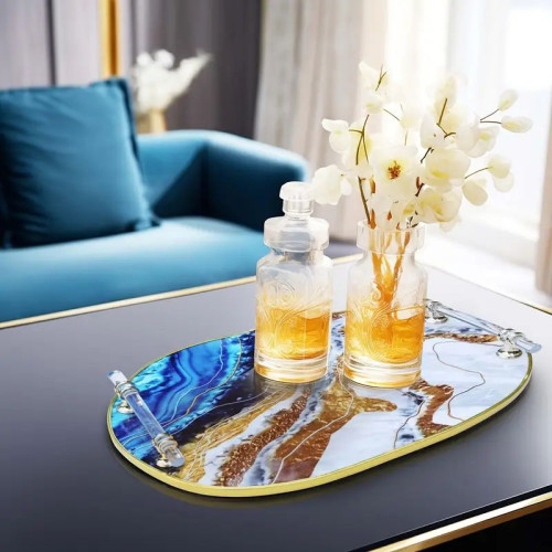 Plateau décoratif de service ovale effet marbre bleu et doré de dimensions 40x26x5 cm disponible sur Mbectemi Market