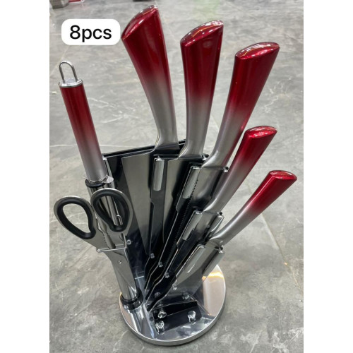  Set de 8 couteaux de cuisine avec manches dégradés rouge et argent, ciseaux et aiguiseur sur support rotatif chromé Mbectemi Market.