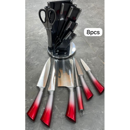  Set de 8 couteaux de cuisine avec manches dégradés rouge et argent, ciseaux et aiguiseur sur support rotatif chromé Mbectemi Market.