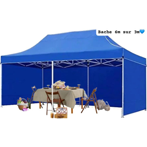 Grande tente tonnelle de jardin pliante bleue de 6x3 mètres abritant une grande table dressée pour un repas