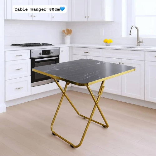 Table a manger pliante effet marbre noir pieds dores 80x80x75 cm Table à manger pliante effet marbre noir et pieds dorés de dimensions 80x80x75 cm disponible sur Mbectemi Market