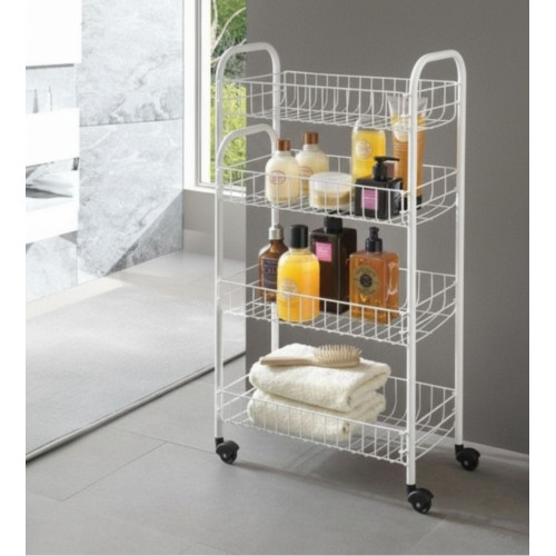 Chariot de rangement blanc à roulettes à quatre niveaux avec des produits de beauté et des serviettes