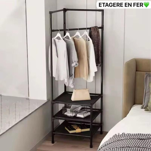 Meuble dressing de coin noir installé dans l angle d une pièce montrant la penderie et les étagères de rangement