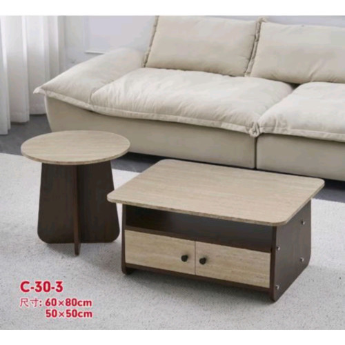 Ensemble table basse rectangulaire avec tiroirs et petite table ronde d'appoint devant un canapé beige