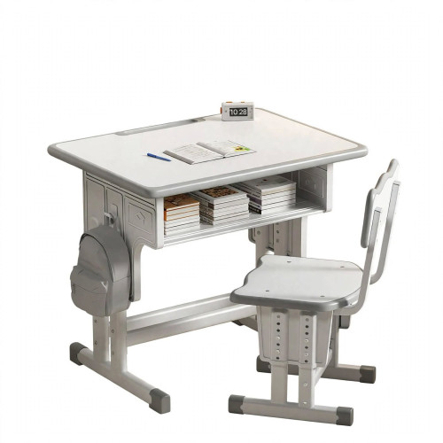 Table d'étude et chaise réglable enfant blanc et gris Enfant assis écrivant sur un bureau d'étude ergonomique blanc et gris réglable en hauteur avec sac suspendu