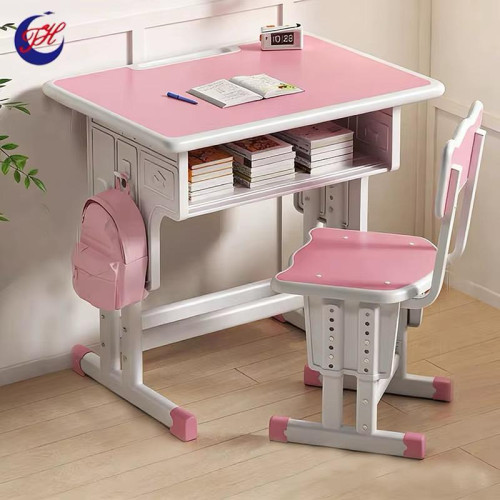Ensemble bureau d'étude rose pour enfant réglable en hauteur avec sa chaise assortie et un sac à dos suspendu